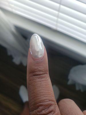 The replacement nail placed on crooked with the wrong chrome or too much chrome