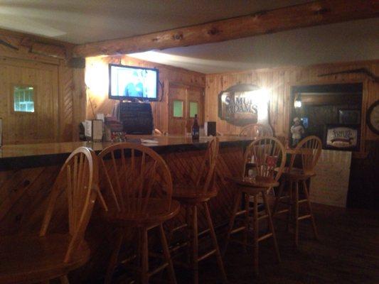 Bar area with full bar of beer, wine and alcohol