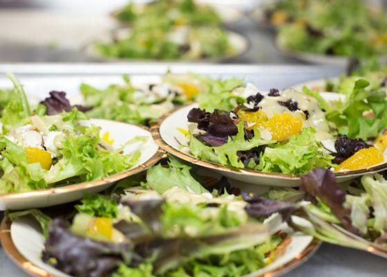 We have a variety of fresh salads, often featuring fresh produce donations.