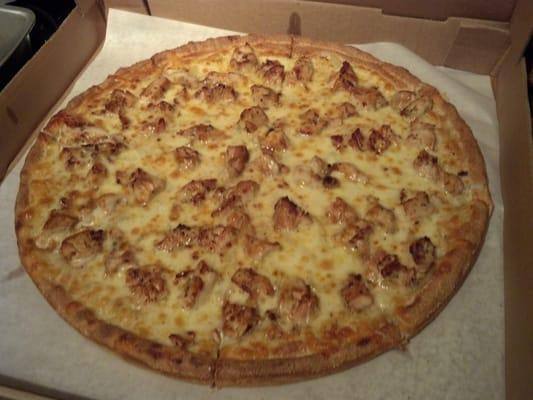 Chicken Santorini pizza chicken carmelized onions mozzarella and white sauce.  YUMMY