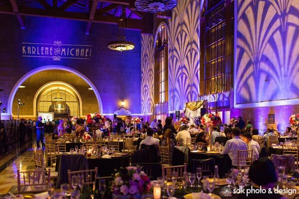 LA Union Station Wedding - black table linens, gold chiavarri chairs, white napkins, gold chargers, silverware, glasses, etc.