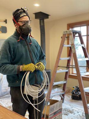 Recessed lighting install - Isaac geared up and ready for the attic!