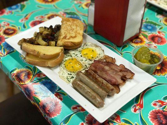 Two Eggs, extra side of Meat, and Breakfast Potatos