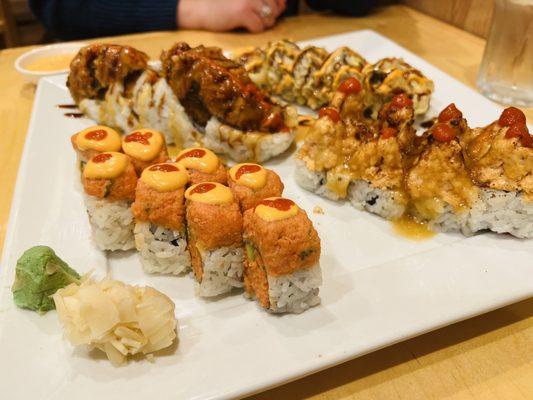 Volcano Roll (Lower left), Salmon on the Beach Roll (Lower right), Heart Attack Roll (Upper left), Yam Yam Roll (Upper right)