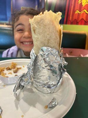 Regular chicken burrito with a happy girl