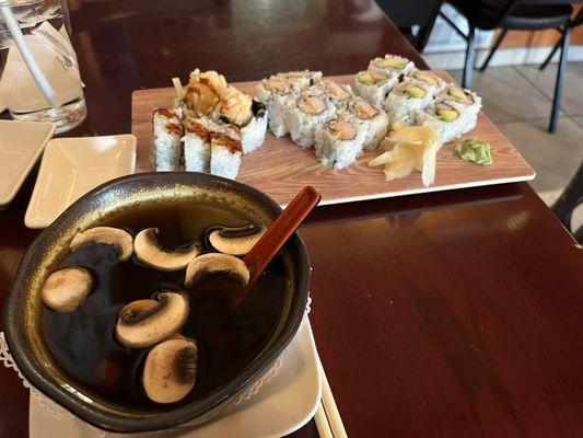 Clear broth soup, shrimp tempura roll, spicy crab roll and a California roll.