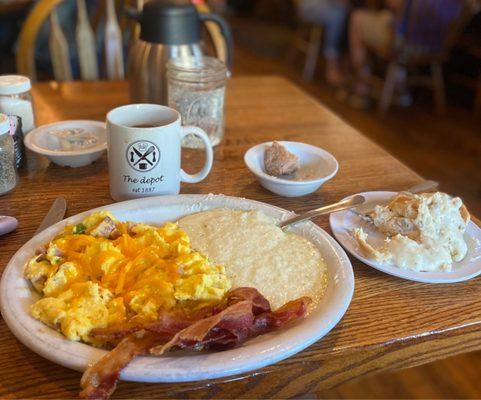 Western Scramble with grits, side of bacon, half order of biscuits and gravy.