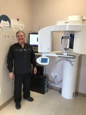 Dr. Madrid with his fancy CBCT Scan machine.