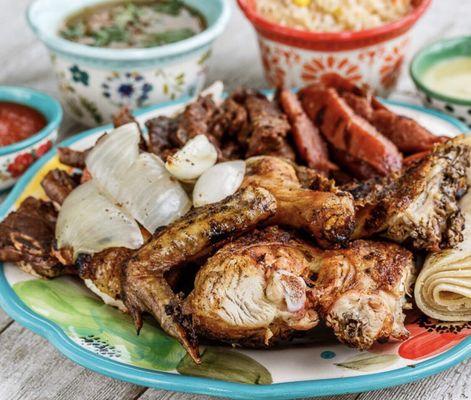 Grilled Chicken  with rice, Charro Beans, tortillas, lime, grilled onion, &salsa