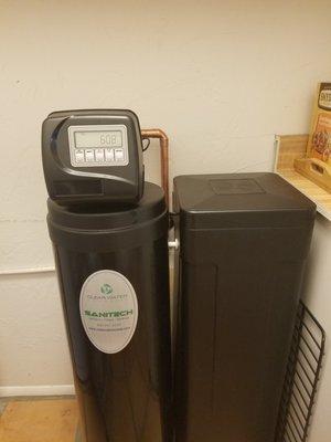 They were able to make the softener fit under the cabinets in the laundry room.