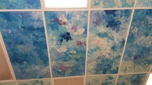 The hand painted ceiling tiles make you feel like you're floating in a sky garden!