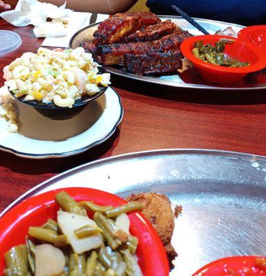 Seafood salad, ribs and what's left of the hush puppies and green beans. Most of the BBQ chicken is gone