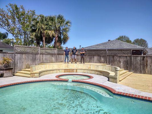 We specialize in building decks, pergolas and gazebos. We can build you a new backyard deck with handrails and stairs out your back door.