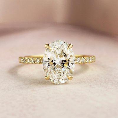 A beautiful diamond oval engagement ring created by Gopal from govind and sons