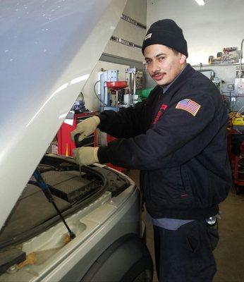 Miguel Ramos is our technician ready to work on your vehicle.