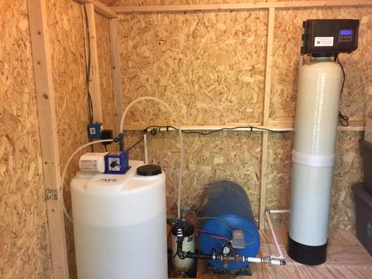 Our team professionally installed this iron filter and chlorinator for a homeowner.