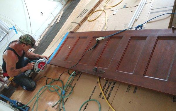 A nice gesture: John trimmed the closet door, including the top - the door casing had shifted since it was built - in 1910.