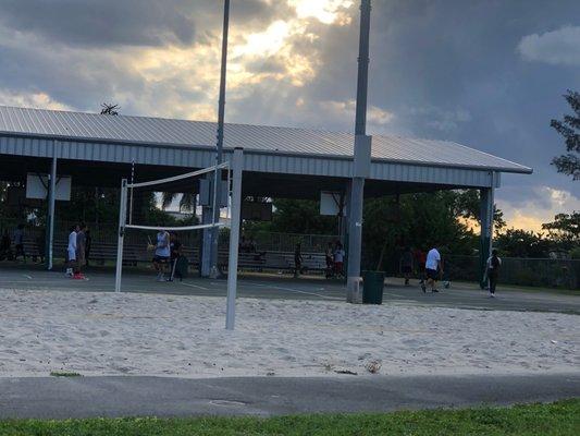 Sand volleyball court.