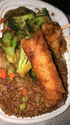 Shrimp with Broccoli and an egg roll! Nice big portion size! Rice had too much sauce in it, though. November 24th, 2023.