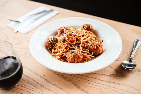 Spaghetti & Meatballs with parm in our homemade pomodoro sauce