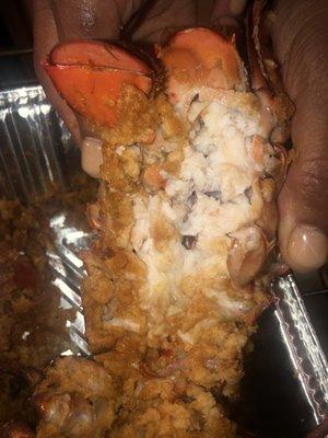 Inside of the stuffed lobster tail... not edible. Can get you sick.