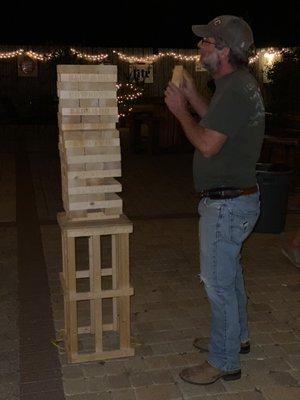 Come show off your balancing skills with Giant Jinga on the patio