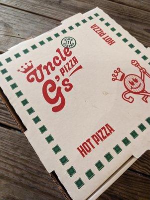 Pizza box with new logo and mascot