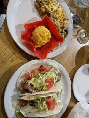 Taco platter with side of chipotle mashed potatoes and sweet corn cake