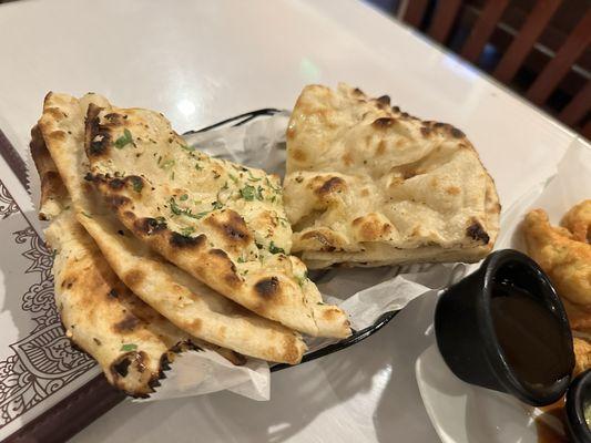 Left: Garlic Naan  Right: Butter Naan