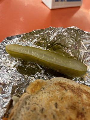 1:2 pickle add on for 1.00 lousy 2-3 day old taste wrapped in huge tin foil wrap to look like a huge pickle slice...