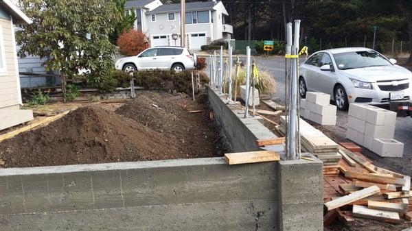 Front yard site wall with fence on top