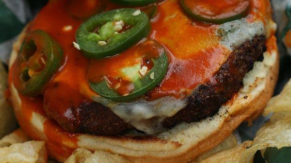 4 Alarm burger- cajun seasoned then topped with pepper jack cheese, buffalo sauce & jalapeño peppers