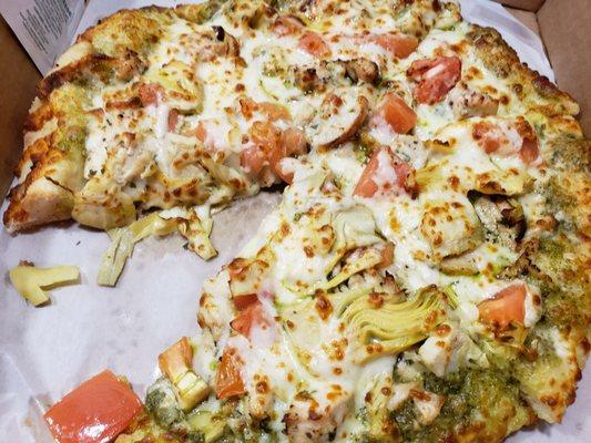 Pesto, grilled chicken, artichoke, and tomato.