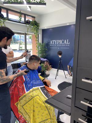 A great experience, awesome haircut on my son. Love the service, the modern and clean place so as the music.