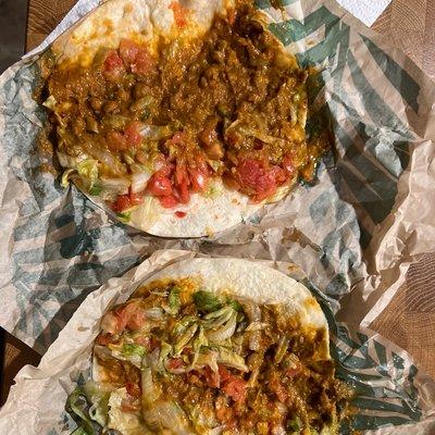 2 Beyond Meat tacos  exactly what it looked like when I unwrapped tacos disgusting.  I've had them before and they do NOT look like this.