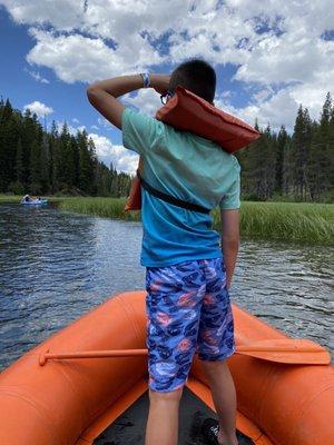 Here is my nephew being the captain of our raft!