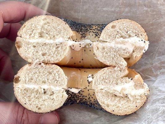 Poppy seed bagel with plain cream cheese