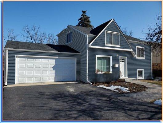 LP Smartside lap Siding with Shake Accent in Gable and White Trim and Gutters-Lombard