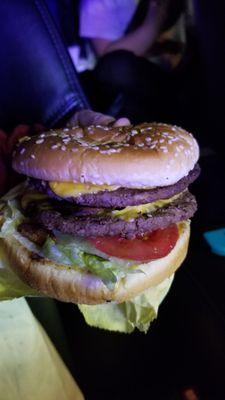 Double bacon cheeseburger with tomato and lettuce