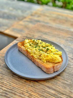 SOFT SCRAMBLE TOAST-W/EXTRA SOFT SCRAMBLED EGGS, SHAVED PARMESAN & CHIVES