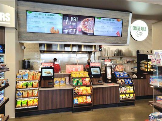 The kitchen area and order kiosks.