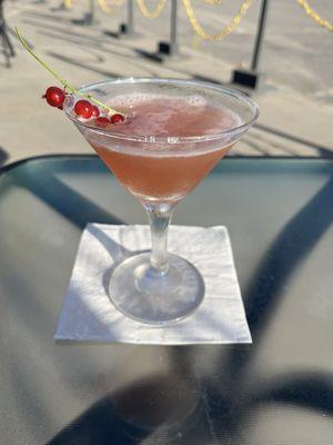 Red currant martini on outside patio