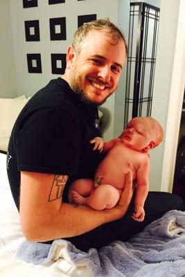 My husband holding our son right after he was born, at the birthing place :)