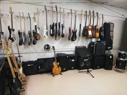 Guitars, drums, amplifiers, & microphones.