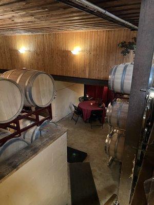 There's 10-12 various sized tables in the wine cellar. Tables have table cloths, and candles. A nice ambiance!