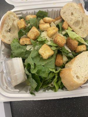 Cesar salad + baguette and dressing on the side