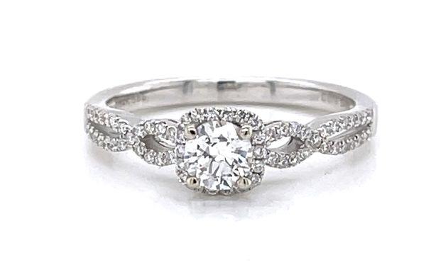 Infinity style halo engagement ring