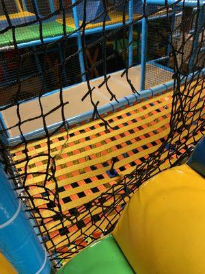 Hole in playground netting that drops 10 ft