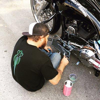 Detailing customer motorcycle prior to delivery