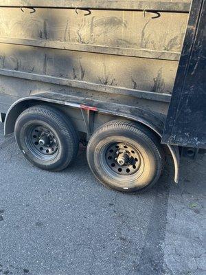 Tires needing replacing on a utility trailer